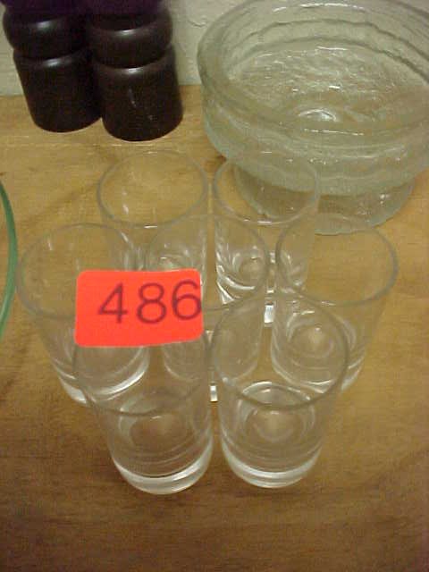 Set of seven clear glass shotglasses