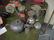 501: Four metallic teapots, one creamer and o
