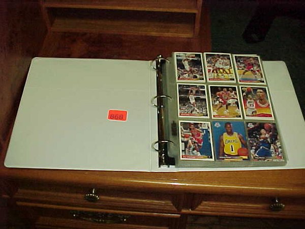 Binder of basketball cards feat. rookie