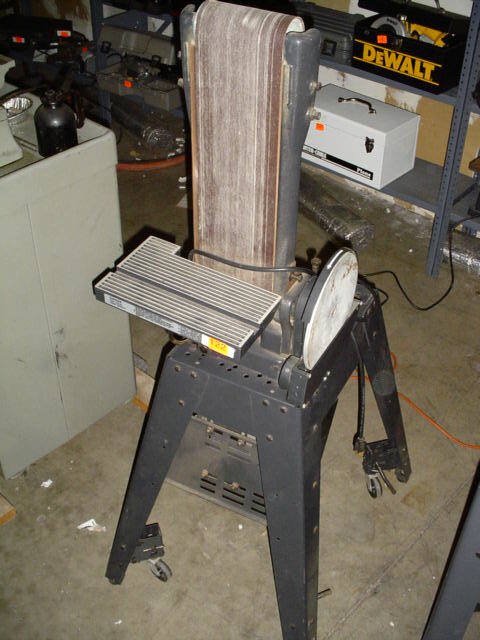 Sears Craftsman dual belt sander on stan