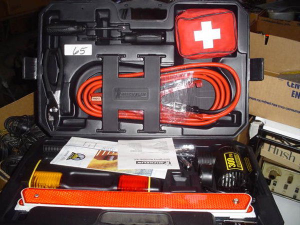 Michelin safety kit. Includes triangle,: Michelin safety kit. Includes triangle, flashing lights, tire changing kit, battery cables, first aid kit. Condition: New in box Shipping dimensions are 20" x 14" x 7" and the weight is 20 lbs. Packag