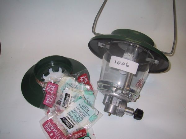 Coleman propane lantern: Coleman propane lantern w/ plastic base and 5 silk lite mantles. Condition: Good. Shipping weight : 8LBS. Shipping dims : 12x12x12. Pkging charge $ 4