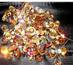 Crystal irridescant beads in topaz