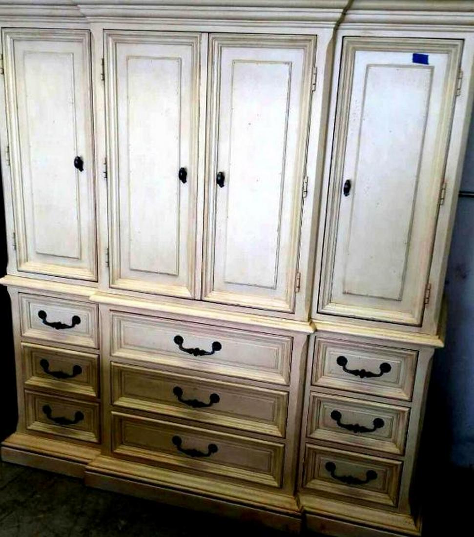 Huntington by Drexel Heritage: Huntington by Drexel Heritage This off-white Heritage Drexel entertainment center has ample storage that is accented with its beautiful detail in the design. 68.5" tall x 65" wide x 20" deep.