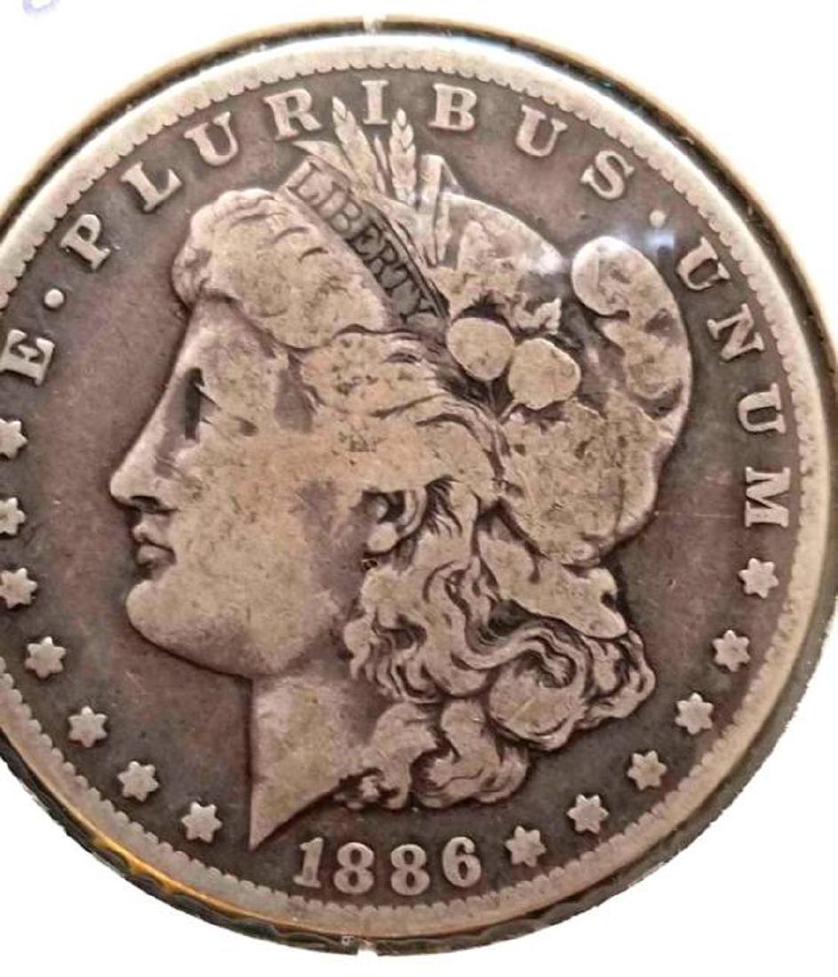 .900 SILVER 1886 O MORGAN SILVER DOLLAR (1 of 2)