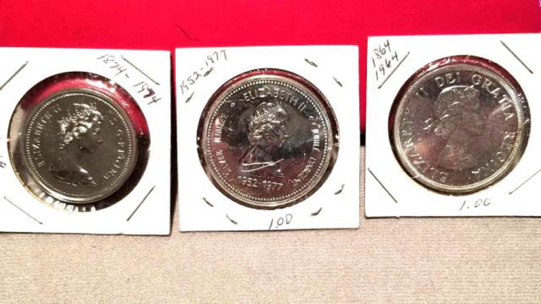 THREE (3) ONE CANADIAN SILVER DOLLAR COINS (1 of 2)