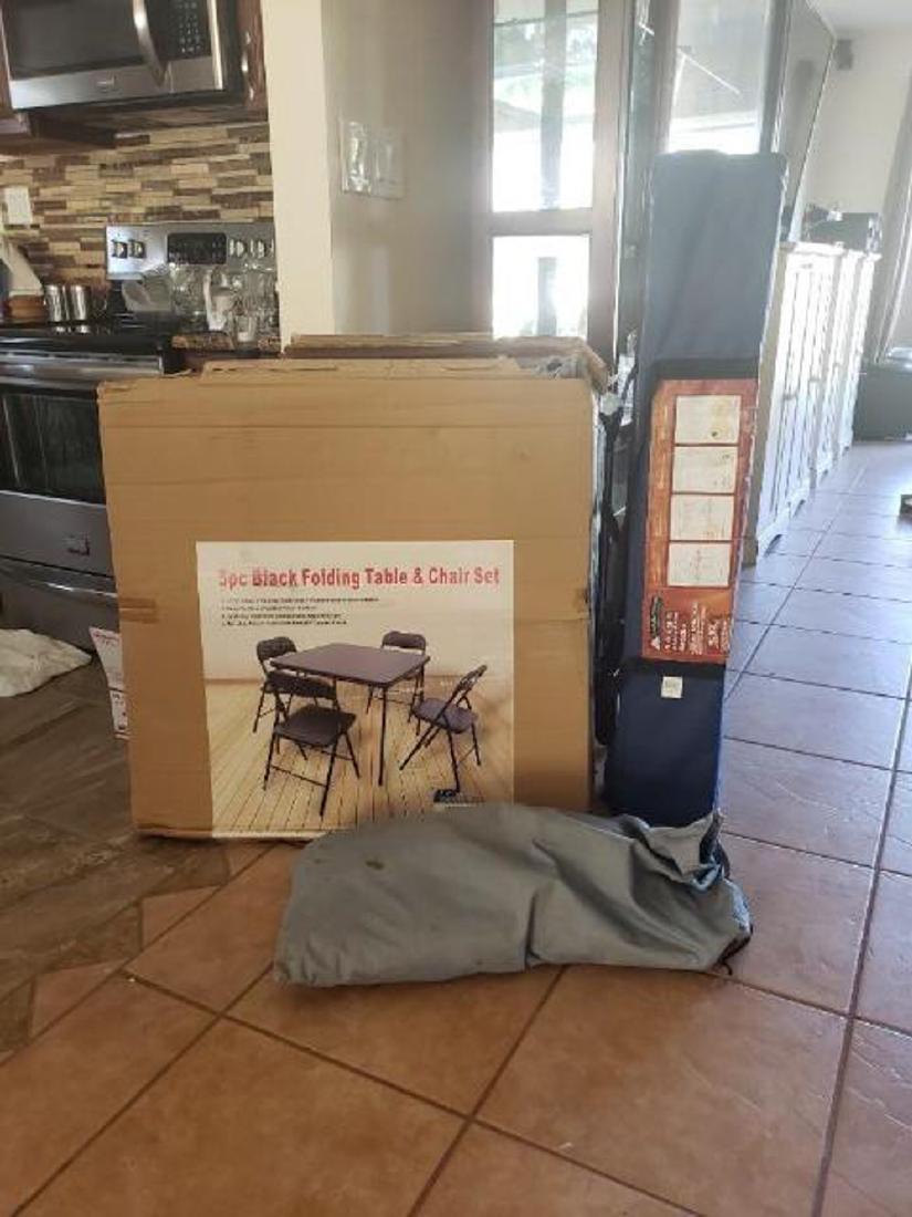 Lot of Outdoor Equipment: Lot of Outdoor Equipment : NIB 5pc Black Folding Table and Chairs Set, good for setting up a booth at a swap meet or to eat outside while RVing. Tent, size and full condition unknown NIB 9'x9' Gazebo