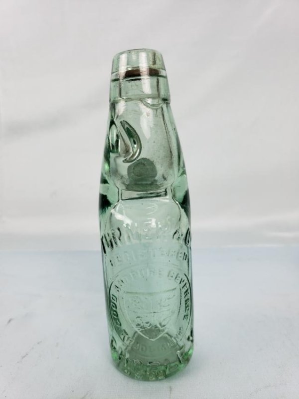 TURNER & Co CHORLEY 10oz CODD BOTTLE COAT OF ARMS IN S: TURNER & Co CHORLEY 10oz CODD BOTTLE COAT OF ARMS IN SHIELD, still has the stopper/marble inside.