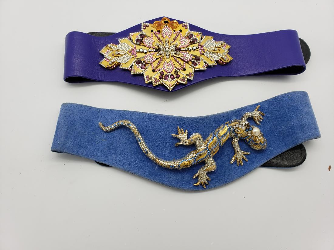 SWAROVSKI CRYSTAL BELTS marked Ermine, Beverly Hills, H: Two gorgeous and collectible belts, highly sought after, impossible to find, extremely collectible. One is black with lizard and pearl design and one is blue with starburst design. Marked Style 75 and