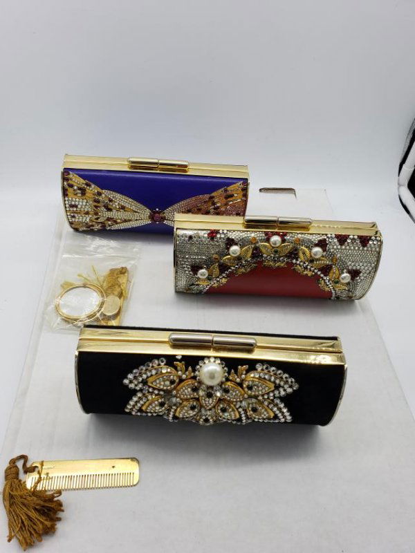 3 RARE JEWELED ERMINE BEVERLY HILLS PURSES: One of each blue, red and black Ermine Beverly Hills purses, handmade in Austria, covered with Swarovski crystals. These include Judith Leiber combs, made in Italy and two Judith Leiber combs and one