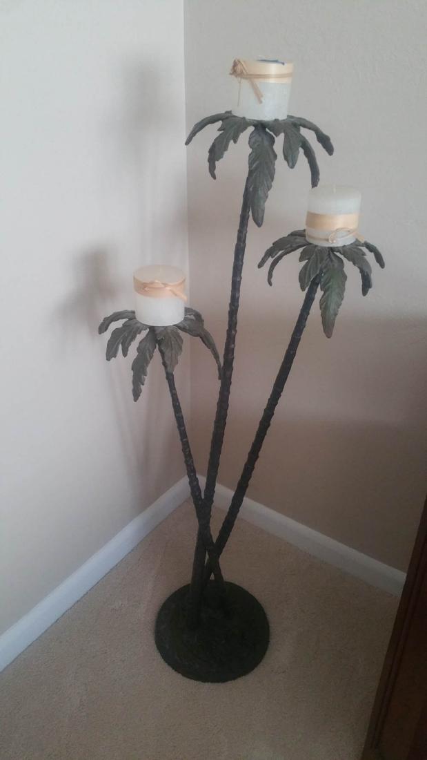 TROPICAL PALM LEAF DESIGN CANDLEHOLDER: 3 candles in glass holders sit on top of each palm tree leaf group finished in a nice green color. A nice piece for the corner of your home, in front of the fireplace or on the lanai.