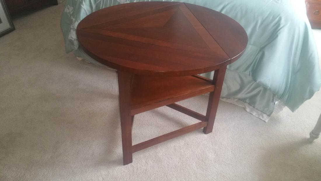 OUTLOOK INTERNATIONAL LTD. WOOD ROUND DROP LEAF TABLE (1 of 5)