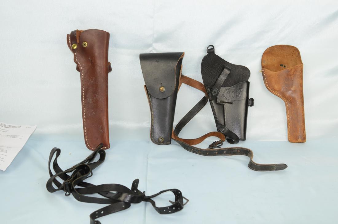 (4) LEATHER HOLSTERS: The two larger revolver holsters with no name are likely for late 1800's cap and ball pistolsShoulder holster marked US is for an M7 made by Bolen Leather Products inc. Product Number 7791527The last 