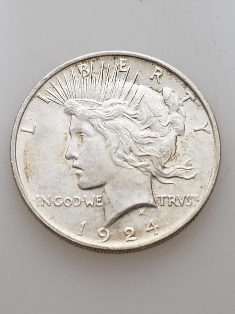 1924 PEACE DOLLAR, .900 SILVER (1 of 2)