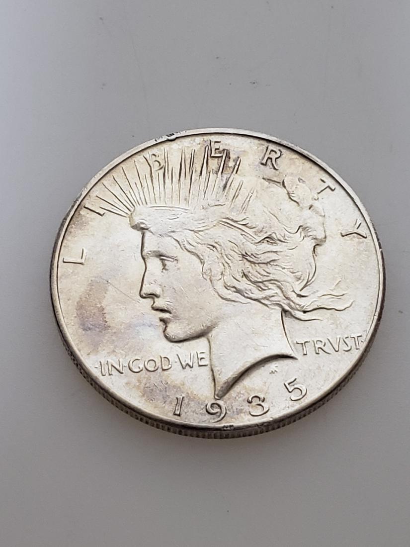 1935 PEACE DOLLAR, .900 SILVER (1 of 2)