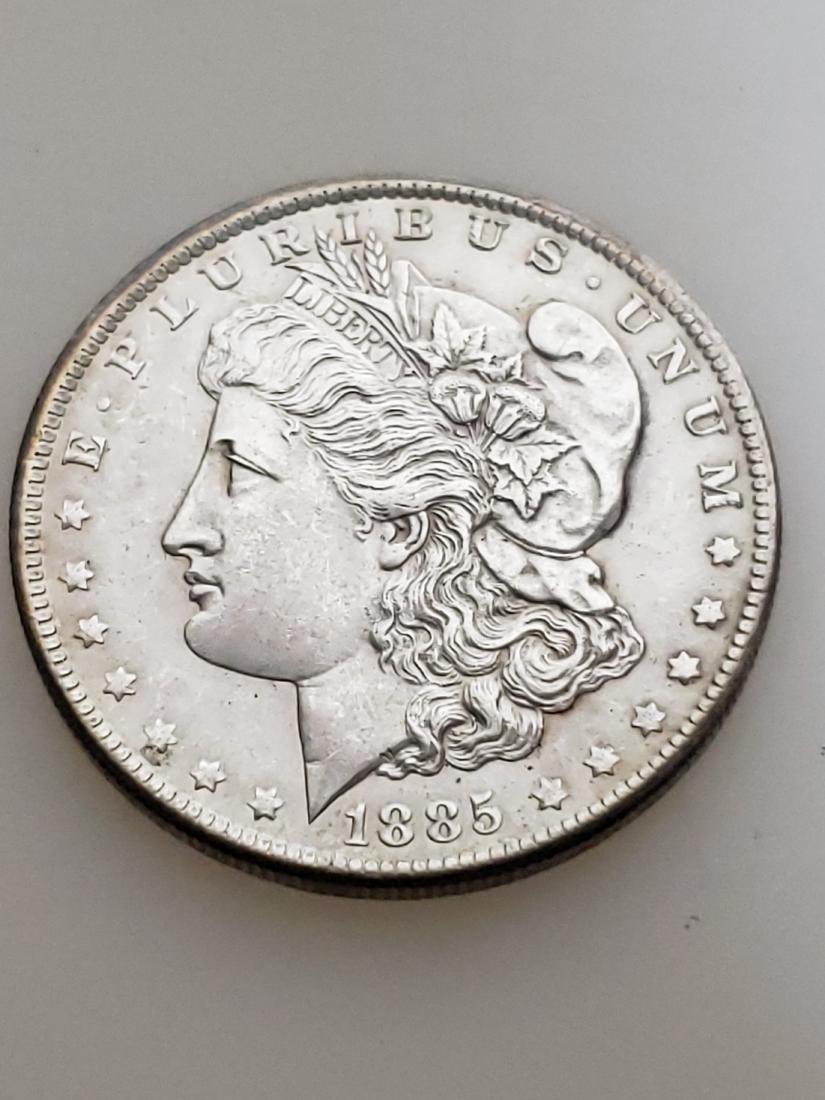 1885-O MORGAN SILVER DOLLAR (1 of 3)