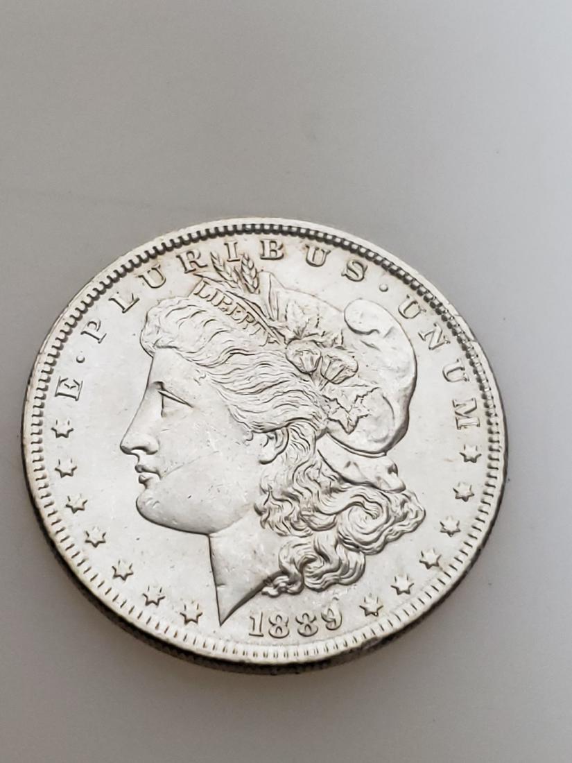1889 MORGAN SILVER DOLLAR (1 of 2)