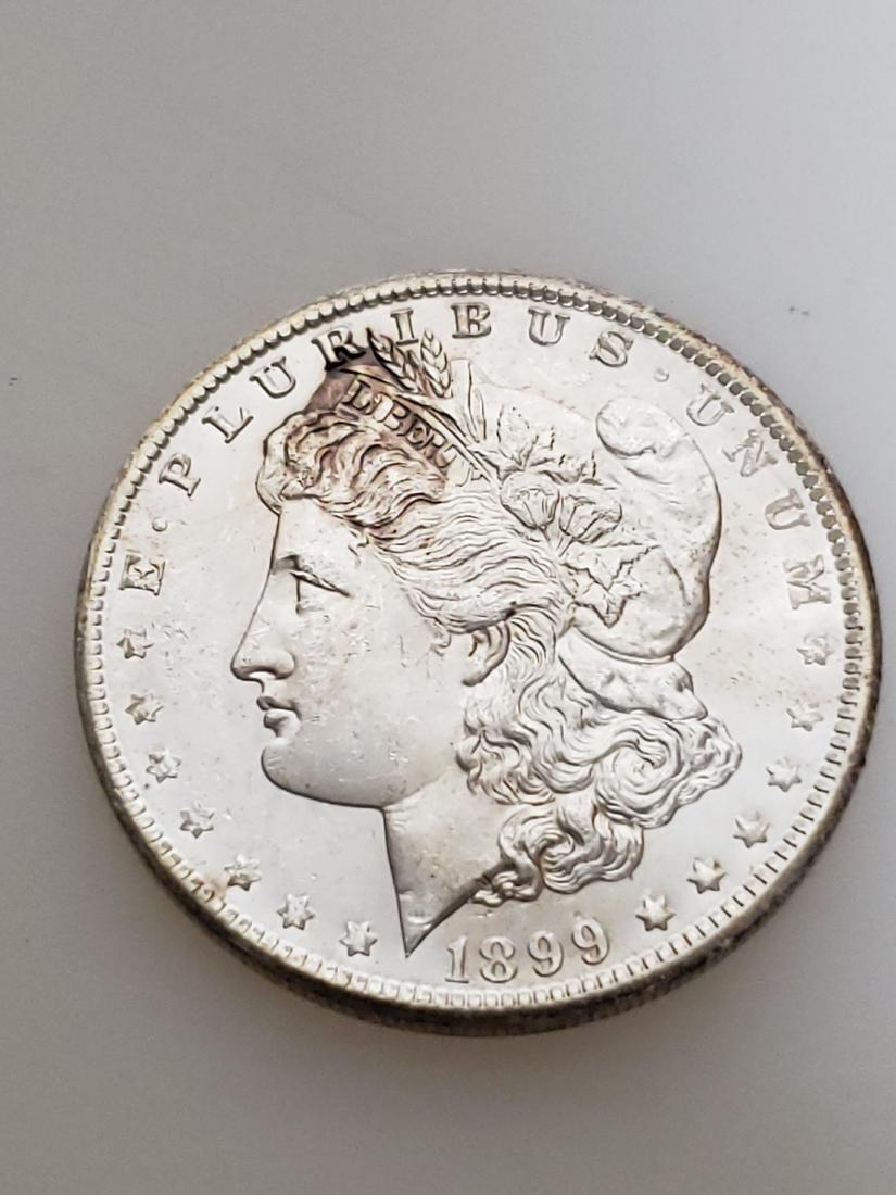1899-O MORGAN SILVER DOLLAR (1 of 3)