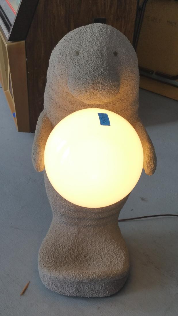 Manatee Indoor / Outdoor Light: The Manatee Indoor / Outdoor light has a popcorn textured body. Works. 36" tall.