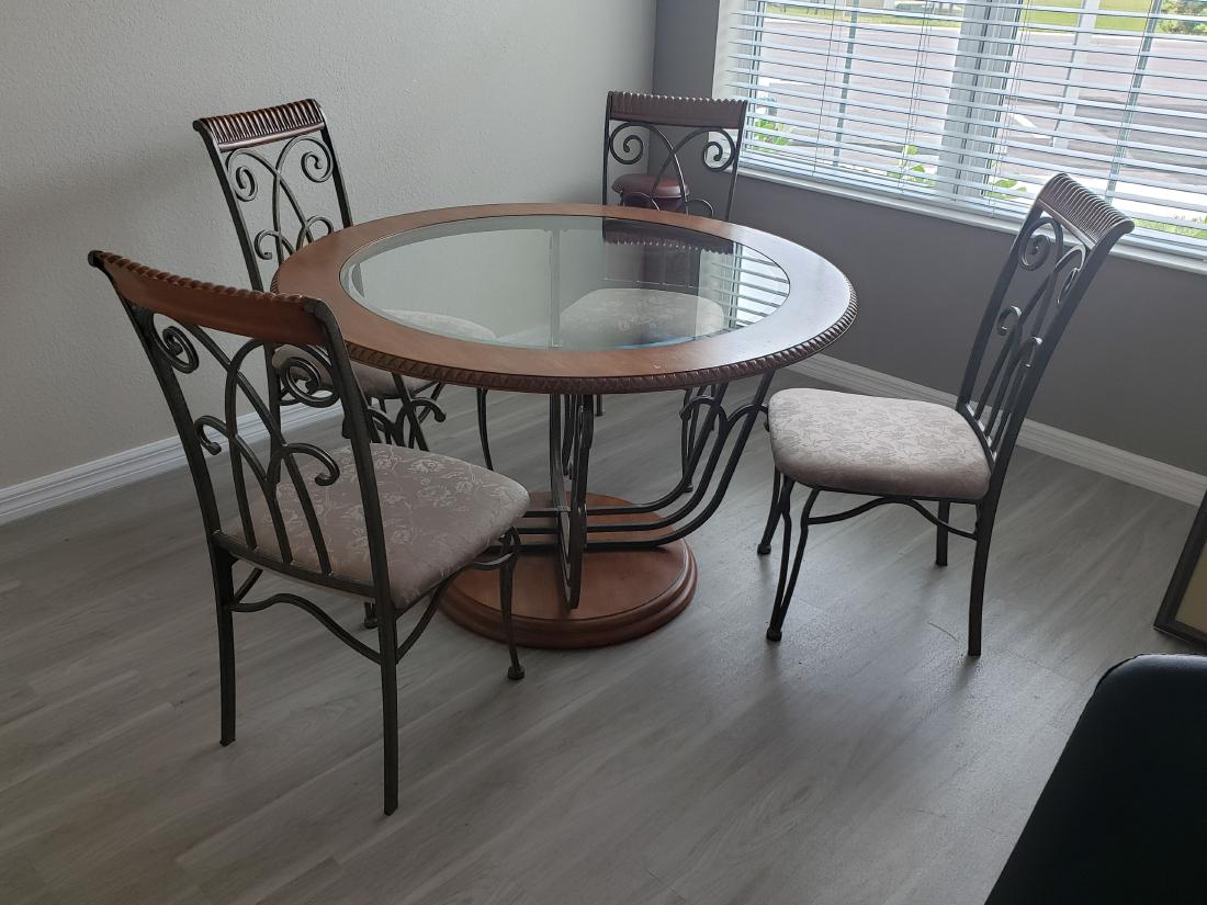 DINING or BREAKFAST ROOM SET/WROUGHT IRON/WOOD/GLASS: Here's a quite fabulous breakfast set or dining room set with round table and four chairs, a center panel of glass surrounded by wood. Furniture doesn't get much better than this lovely set!!! Four or