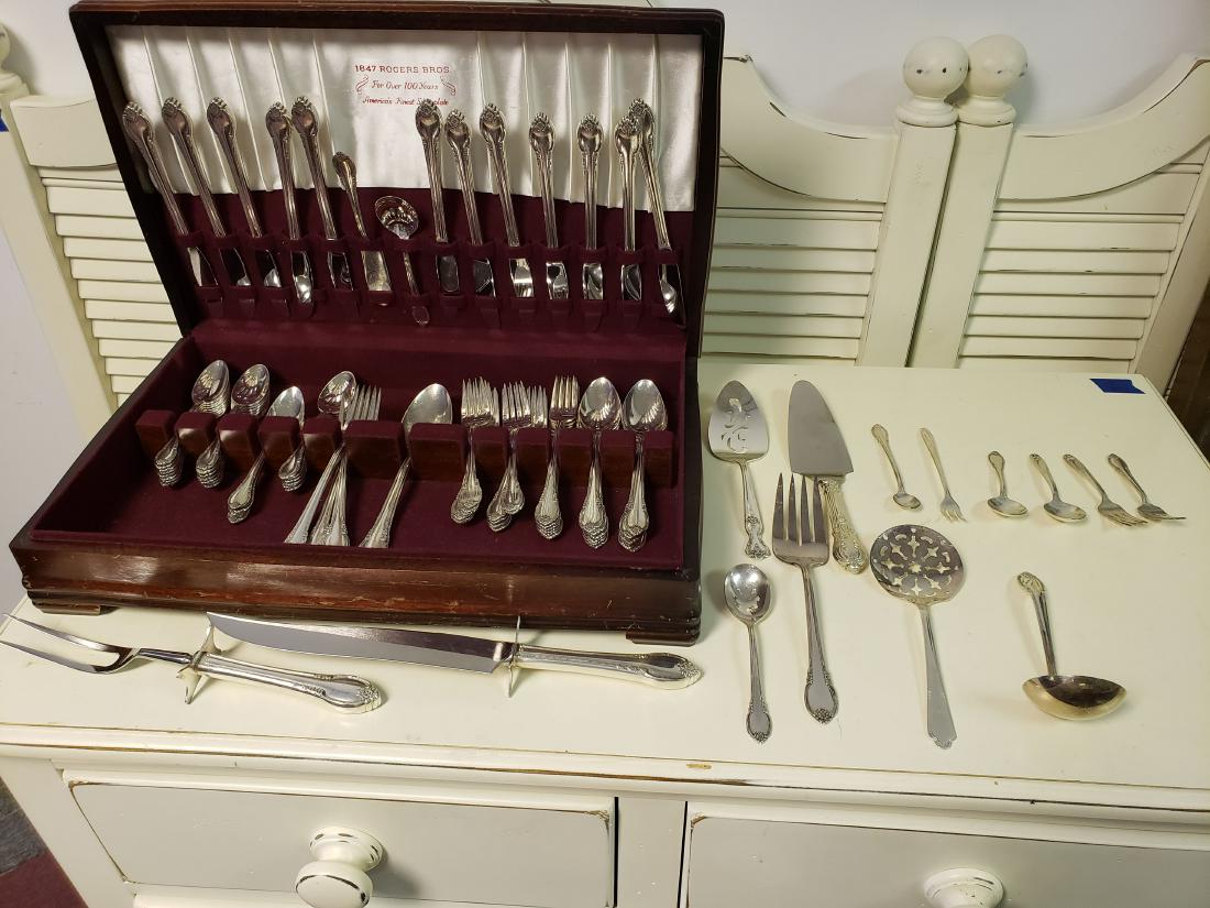 1948 VINTAGE REMEMBRANCE FLATWARE, ROGERS BROS.: Beautiful 1948 vintage 1847 Rogers Bros floral Remembrance pattern flatware set in wood box. Just the way we like to buy it, bidders - you want to know what pattern, we want it in quality and quantity