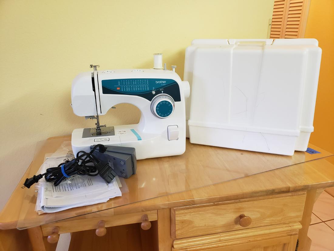 SEWING MACHINE BY BROTHER MODEL XL-2600i: From the Brother sewing machine site, so you will know exactly what you are buying, and this one looks pretty new to me, we have this: "The Brother XL2600i has been built with maximum performance to e