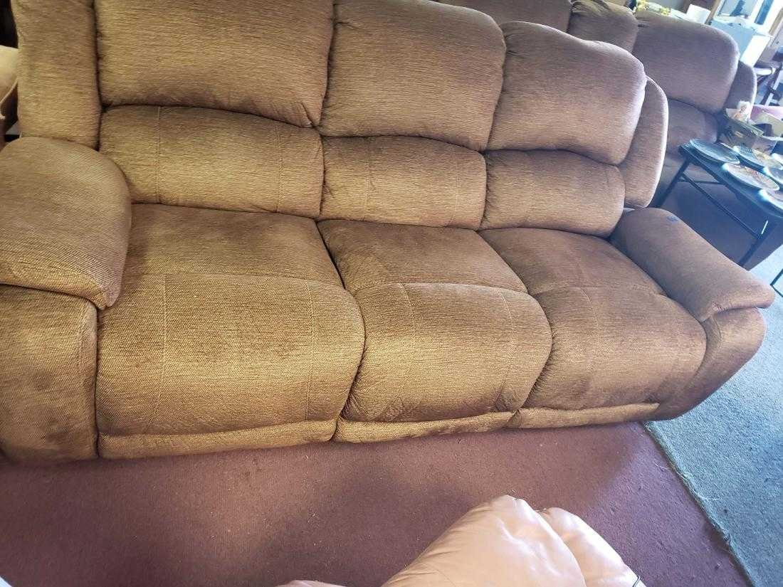 THREE CUSHION CLOTH RECLINER SOFA: 2017 Badcock & More Recliner sofa.