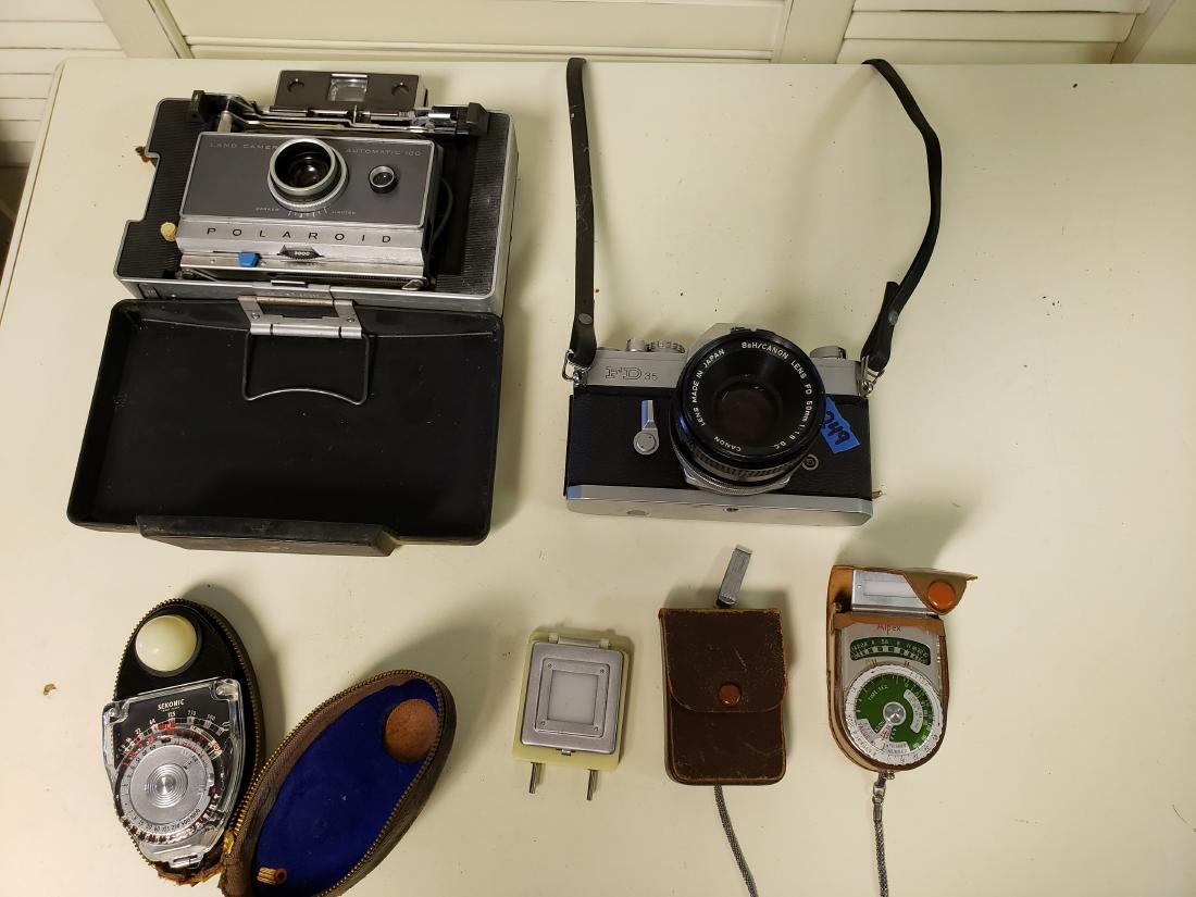 CAMERA AND LENS LOT: This camera and lens lots has: Canon lens FD 50mm f1:1.8,.Polaroid Land Camera, Auto 100, Sekonic Exposure Meter, Alpex exposure meter and Flash and Bell and Howell FD 35mm body.The Canon Lens that is