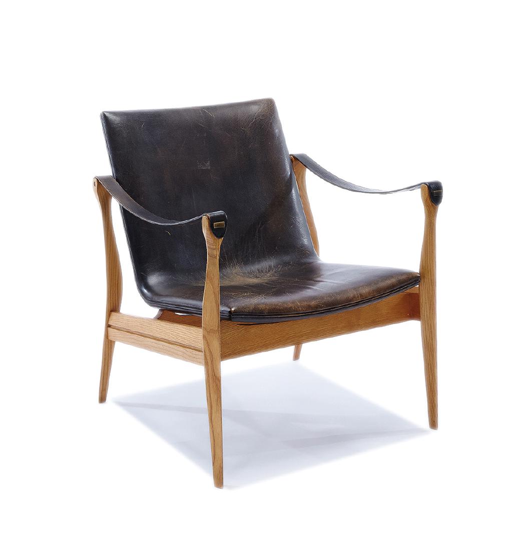 Karen & Ebbe Clemmensen: Lounge chair: Karen & Ebbe ClemmensenLounge chair Fritz Hansen designed 1963 Model no. 4305 27.5" x 24" x 25" Retains tag "Furniture Makers Control/Danish" Literature: Fritz Hansen-Furniture. Manufacturer cat. 1963