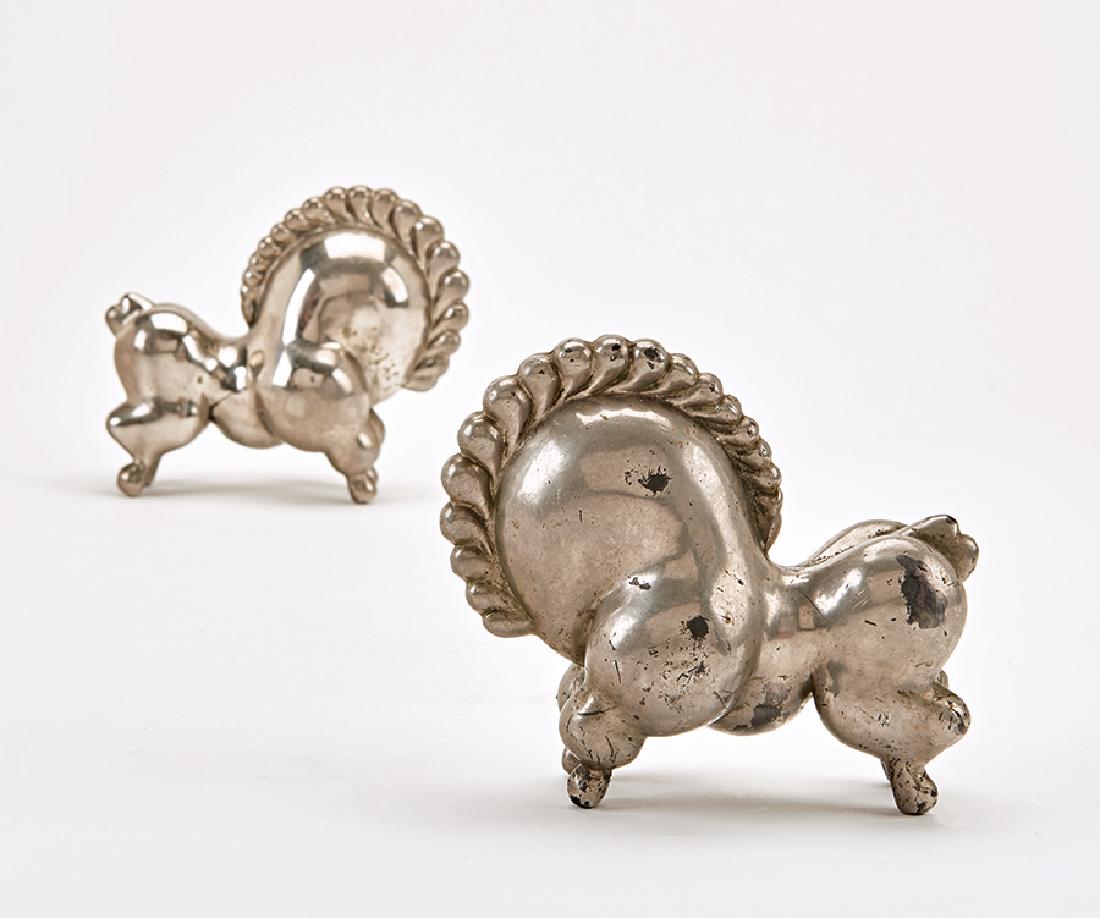 Russel Wright: Libbiloo sculptures (2): Russel Wright Libbiloo sculptures (2) Designed c. 1927 Russel Wright, Inc. Russel Wright, Inc. One with cast mark to underside "RW" Each: 5.5" x 6.5" x 3.25" Literature: At Home in Manhattan: Modern D