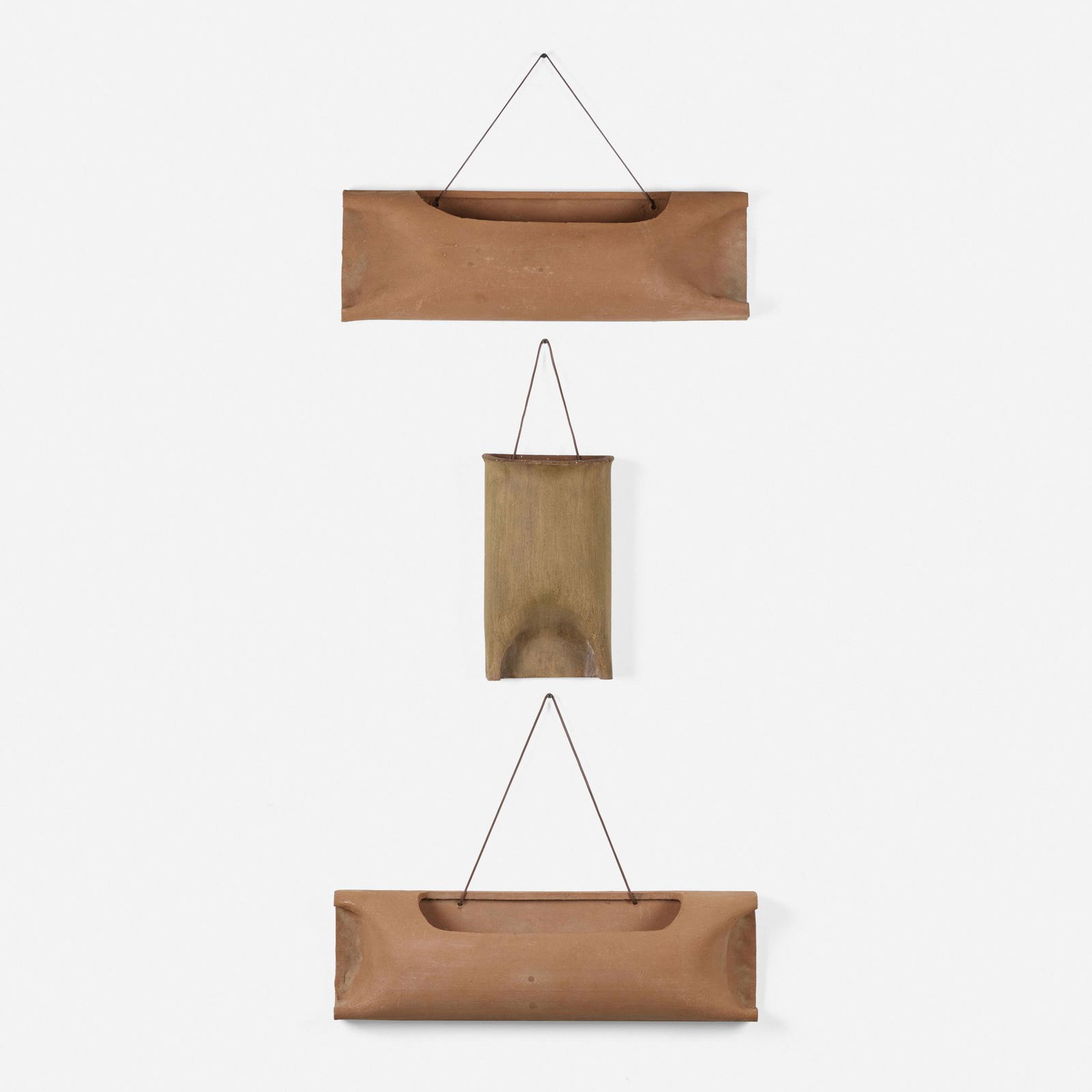 Modern, Wall Pocket planters, set of three: Modern Wall Pocket planters, set of three USA, c. 1990stoneware, cord 14 h Ã— 8 w Ã— 5.5 d in (36 Ã— 20 Ã— 14 cm) 25.5 h Ã— 8 w Ã— 4.875 d in (65 Ã— 20 Ã— 12 cm) 26.5 h Ã— 8