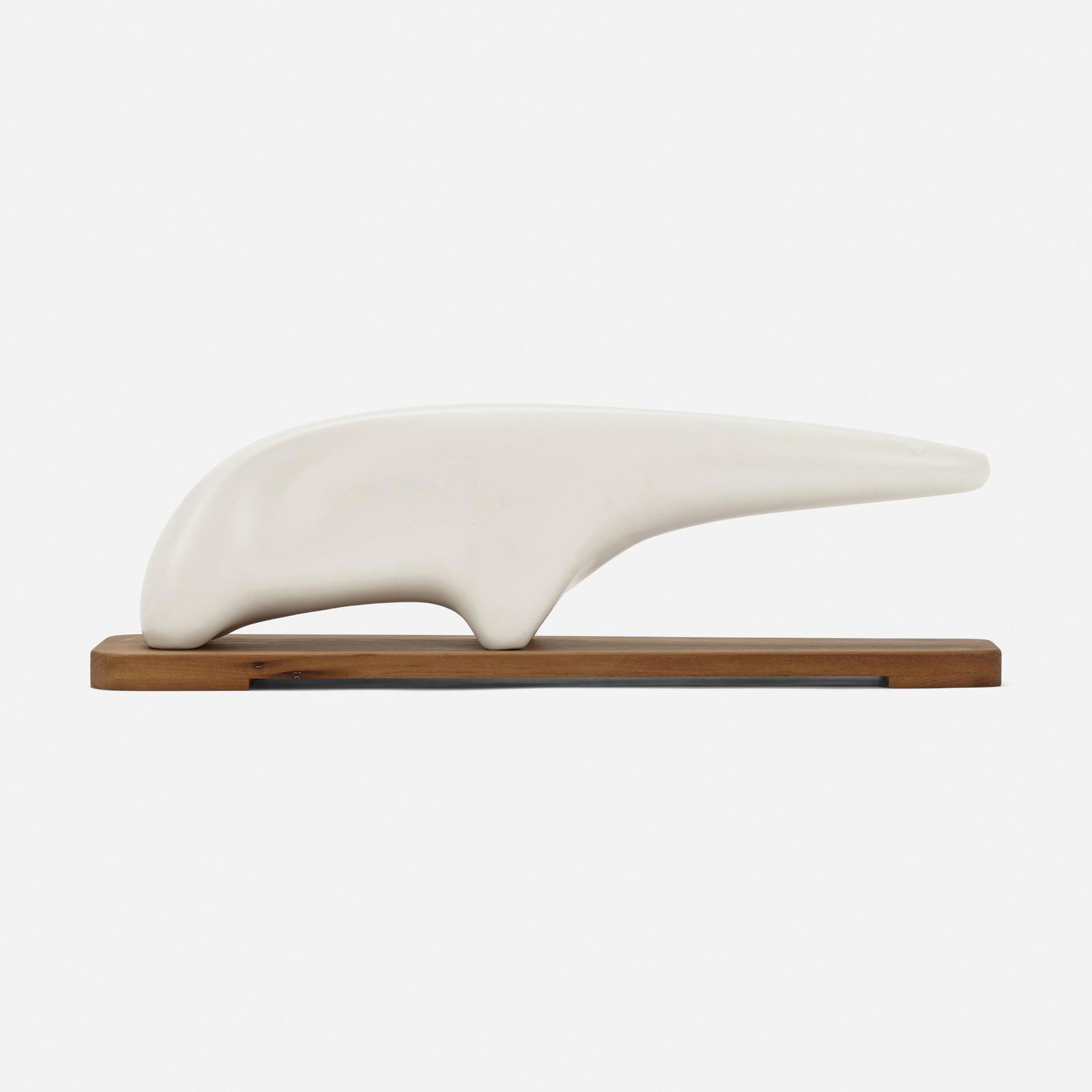 Gordon Newell, Anteater, model NB-1: Gordon Newell Anteater, model NB-1 Architectural Potteryc. 1958glazed stoneware, walnut 7.625 h × 26.5 w × 5.75 d in (19 × 67 × 15 cm) Provenance: