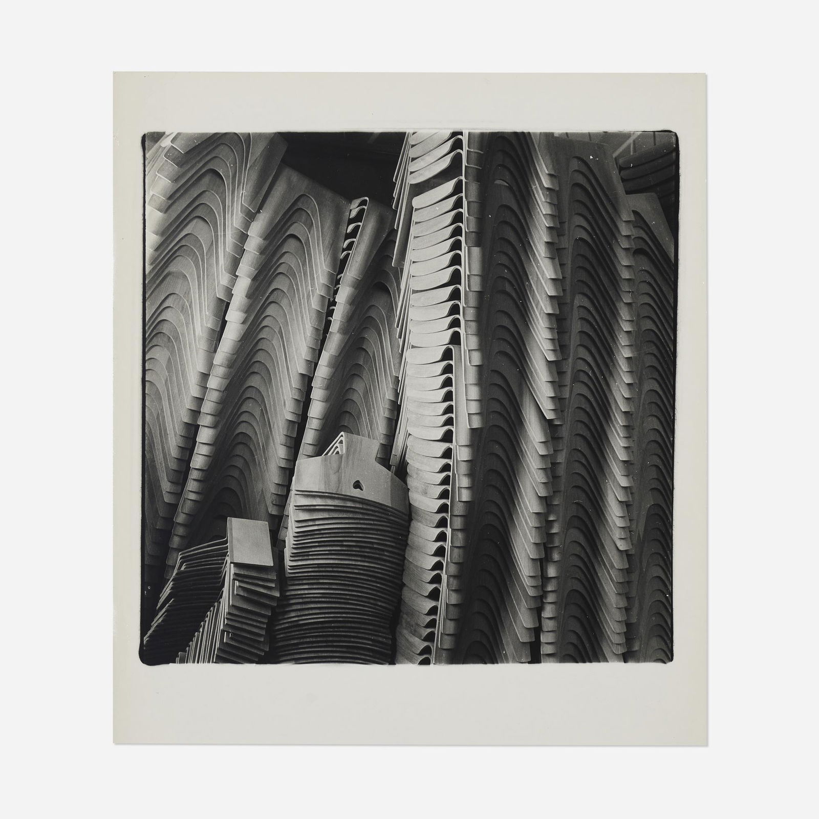 Herbert Matter, Stacked Eames Child's Chairs: Herbert Matter Stacked Eames Child's Chairs 1945 / printed 1976gelatin silver print image: 14.25 h x 14.25 w in (36 x 36 cm) sheet: 18 h x 16 w in (46 x 41 cm) Provenance: