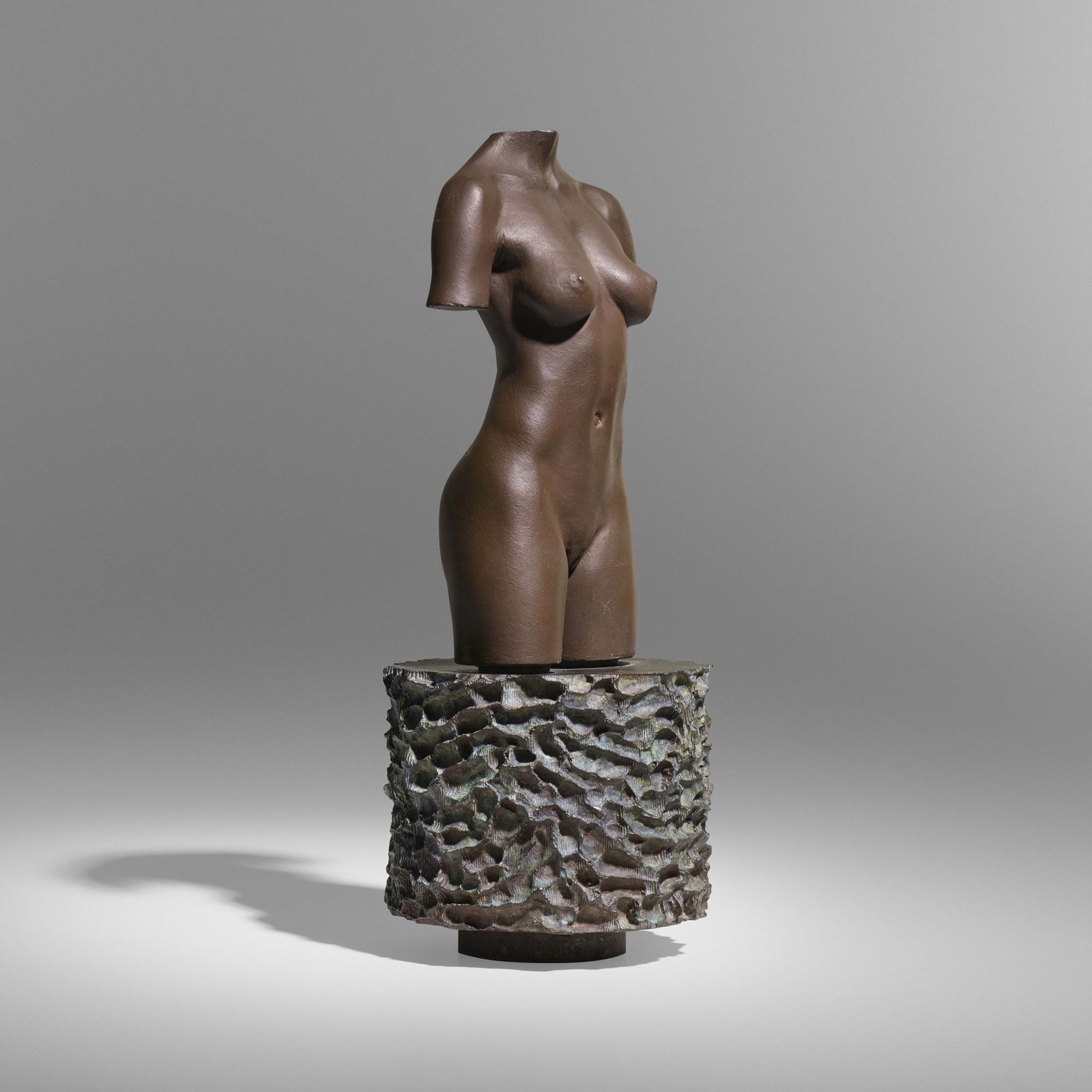 Robert Graham, MOCA Torso: Robert Graham MOCA Torso 1992-95bronzepatinated bronze 11 h x 4.375 dia in (28 x 11 cm) Incised signature to underside 'Mario J.C. Munoz'. This work is from the edition of 3500 published by MO