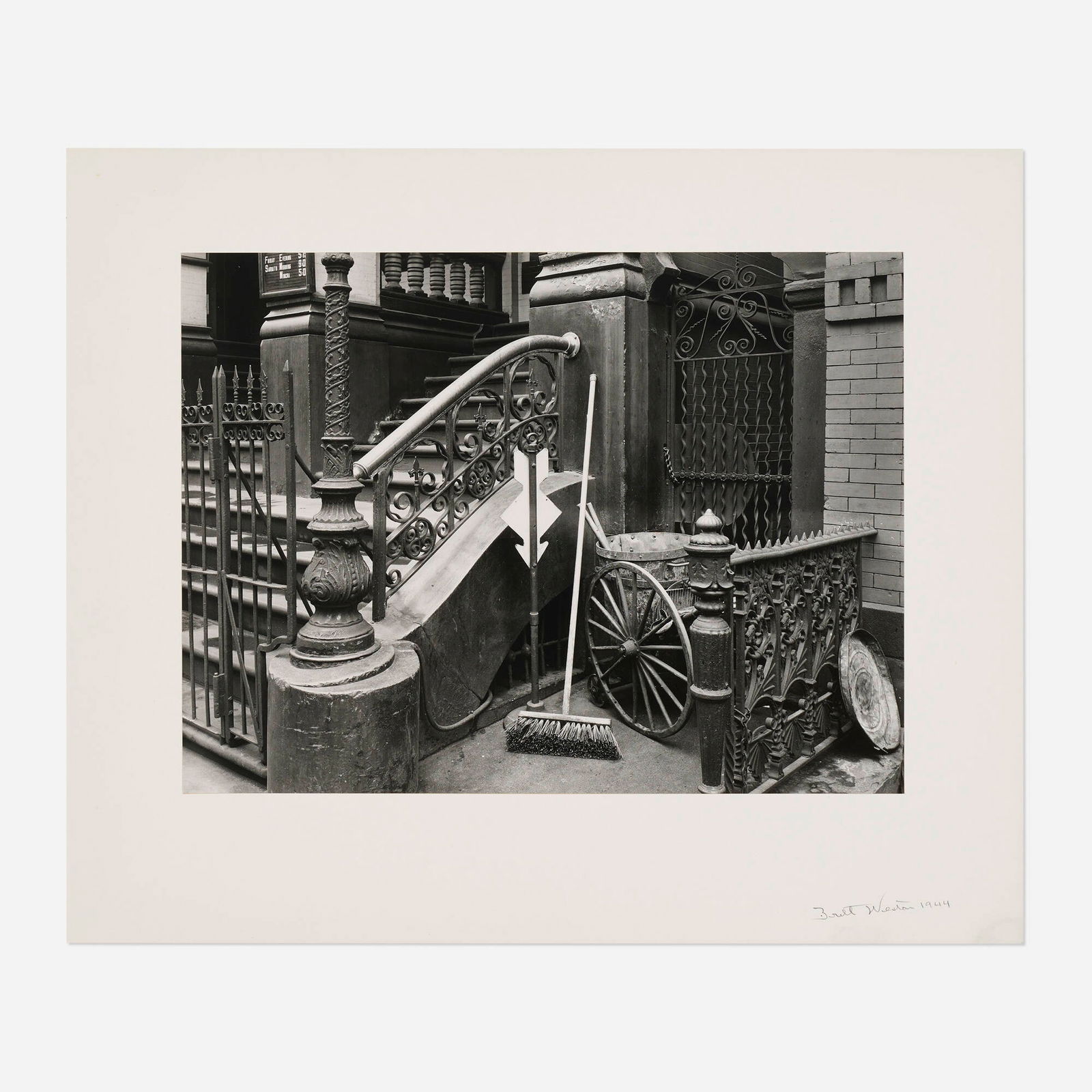 Brett Weston, Stairway with Broom, New York: Brett Weston Stairway with Broom, New York 1944 / printed c. 1970sgelatin silver print image: 10.25 h x 13.5 w in (26 x 34 cm) mount: 15 h x 18 w in (38 x 46 cm) Signed and dated to mount '