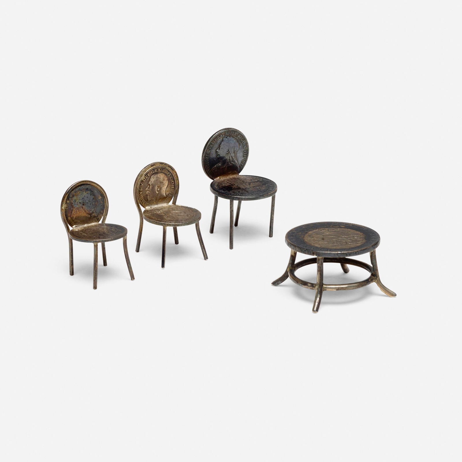 Kris Martin, Honi soit qui mal y pense: Kris Martin Honi soit qui mal y pense 2008coins, silver largest: 1 h x 2 dia in (3 x 5 cm) smallest: 1.5 h x 0.75 w x 1 d in (4 x 2 x 3 cm) Incised signature and date to underside of table