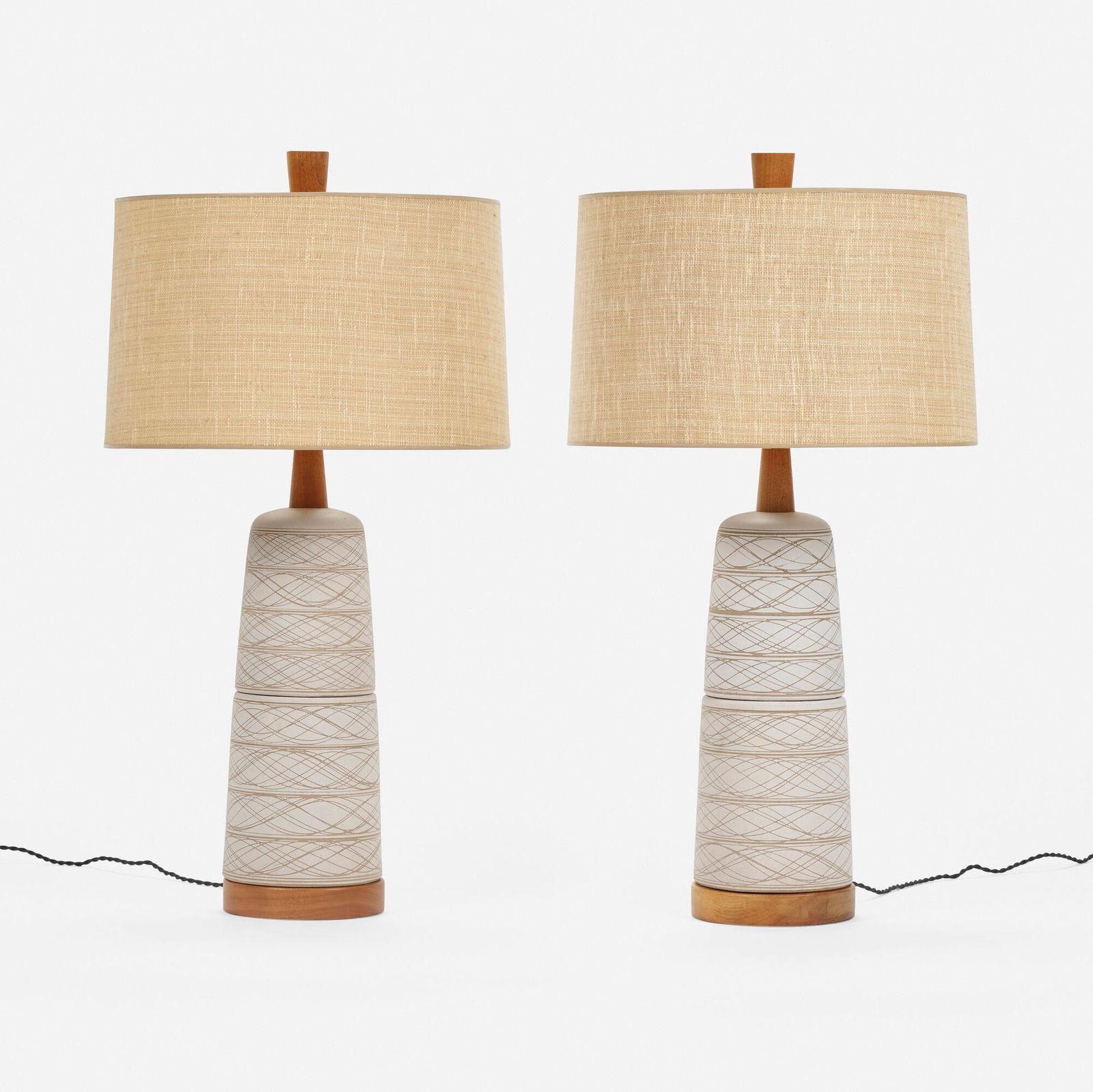 Gordon and Jane Martz, Table lamps, pair: Gordon and Jane Martz Table lamps, pair Marshall StudiosUSA, c. 1955incised and glazed stoneware, walnut, fabric 33.5 h x 18.125 dia in (85 x 46 cm) Decal manufacturer's label to lower e
