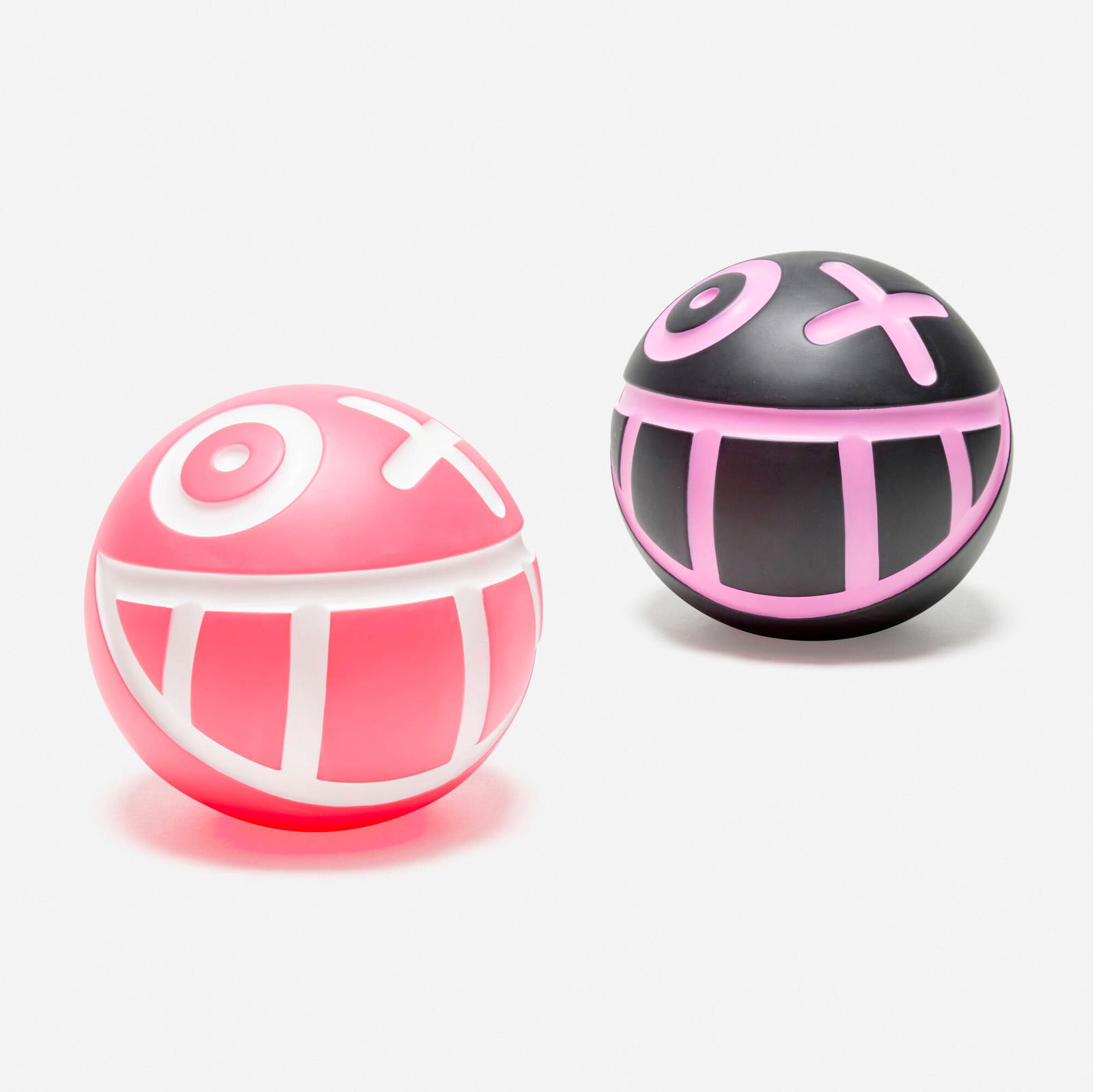 Andre Saraiva, Mini Mr. A Ball (Black and Pink) (two works): Andre Saraiva Mini Mr. A Ball (Black and Pink) (two works) 2018painted cast vinyl each: 5.5 dia in (14 cm) Printed manufacturer's mark to underside of each work 'Andre Medicom Toy 2018 China'.