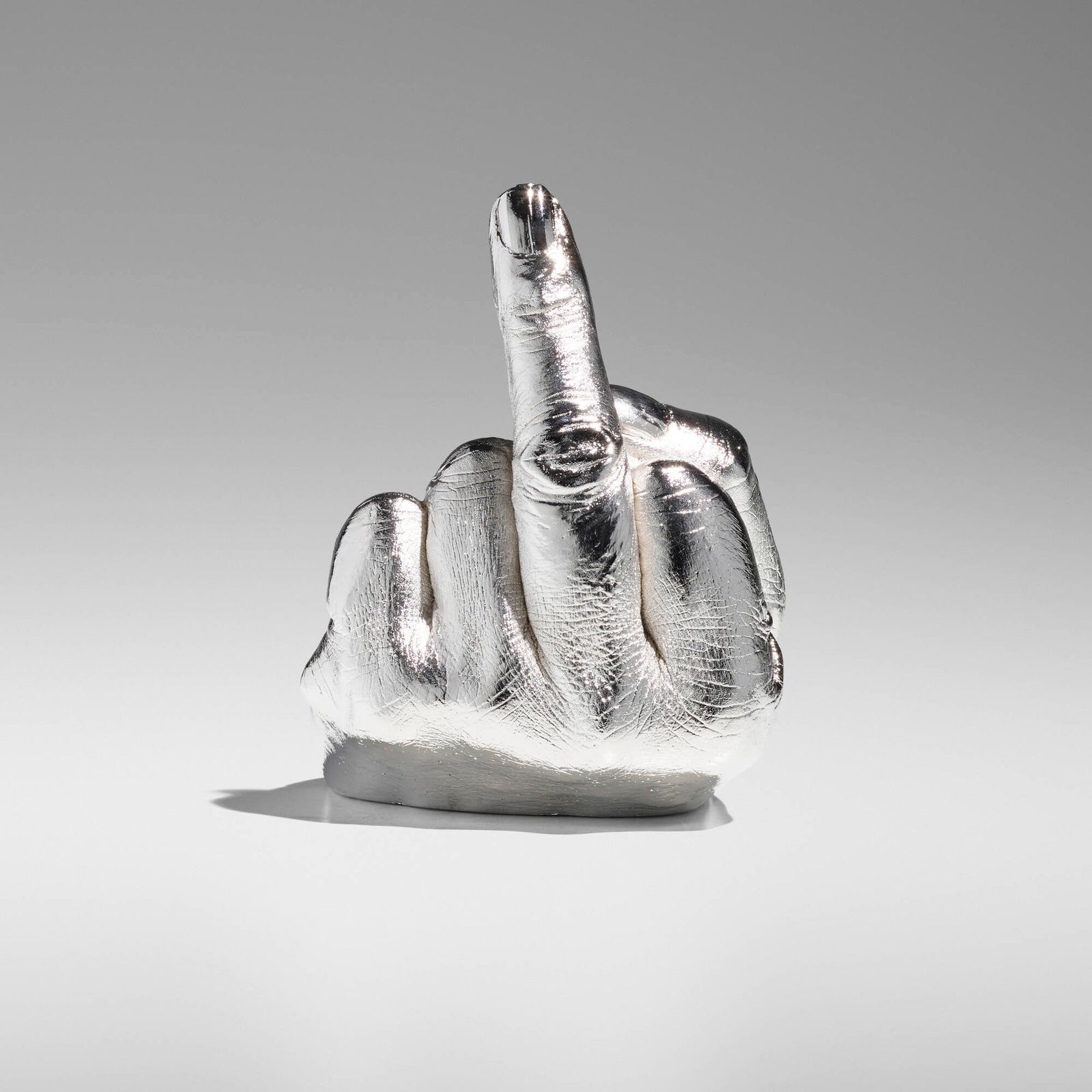 Ai Weiwei, The Artist's Hand: Ai Weiwei The Artist's Hand 2017electroplated rhodium on cast urethane resin 4.75 h x 4 w x 4.25 d in (12 x 10 x 11 cm) Incised signature to underside 'Wei Ai'. This work is from the edition o