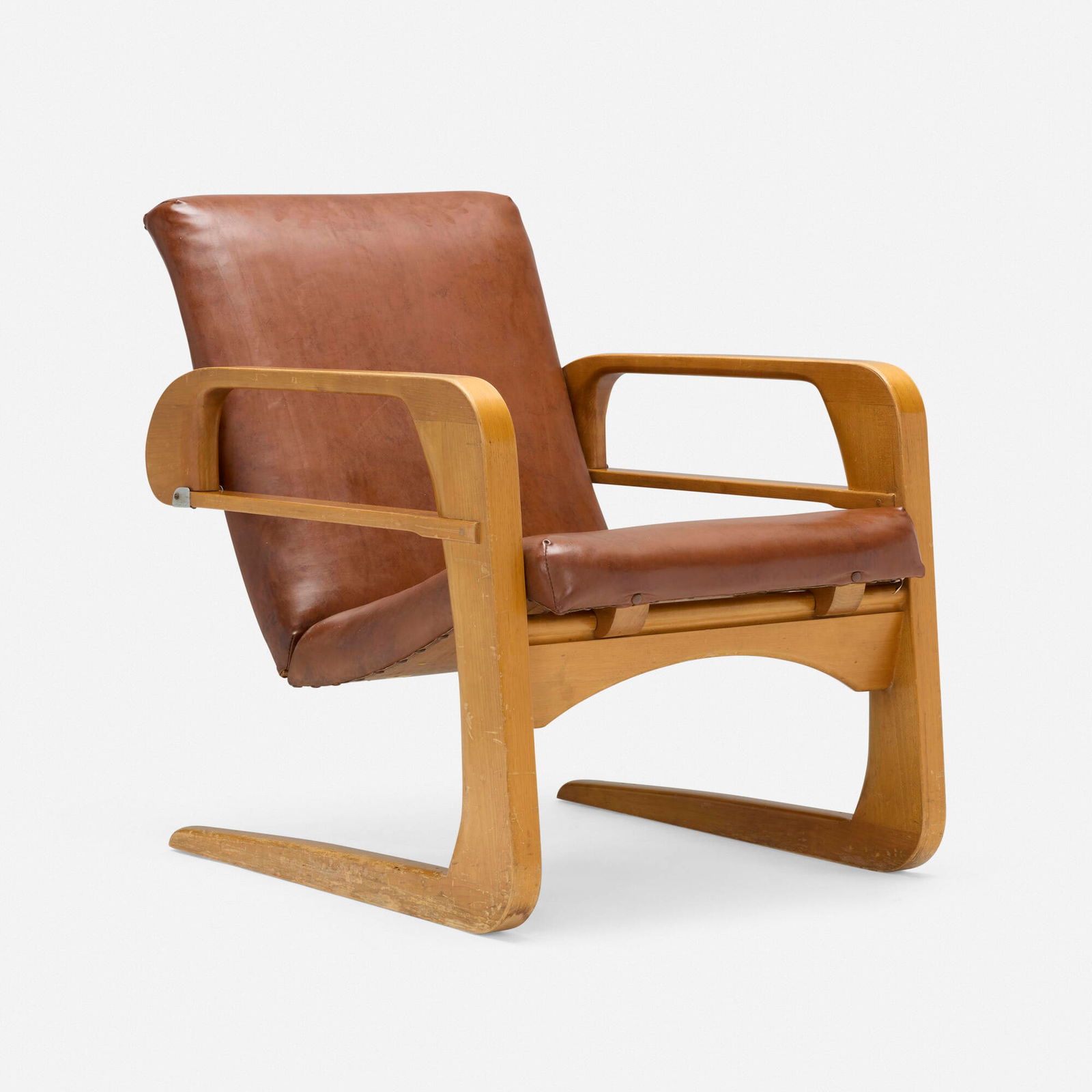 Kem Weber, Rare Airline chair from the Walt Disney Studios, Burbank, CA: Kem Weber Rare Airline chair from the Walt Disney Studios, Burbank, CA Airline Chair CompanyUSA, 1934ash, birch plywood, steel, vinyl upholstery, leather, copper tacks 30.75 h x 25 w x 33.75 d