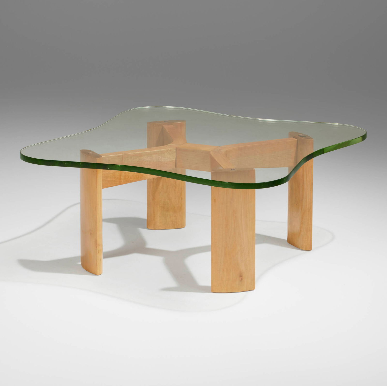 Paul Laszlo, Clover Leaf coffee table: Paul Laszlo Clover Leaf coffee table Hungary/USA, c. 1952birch, glass 15 h x 34.5 w x 30 d in (38 x 88 x 76 cm) Provenance: The Michael & Gabrielle Boyd Collection | Private C