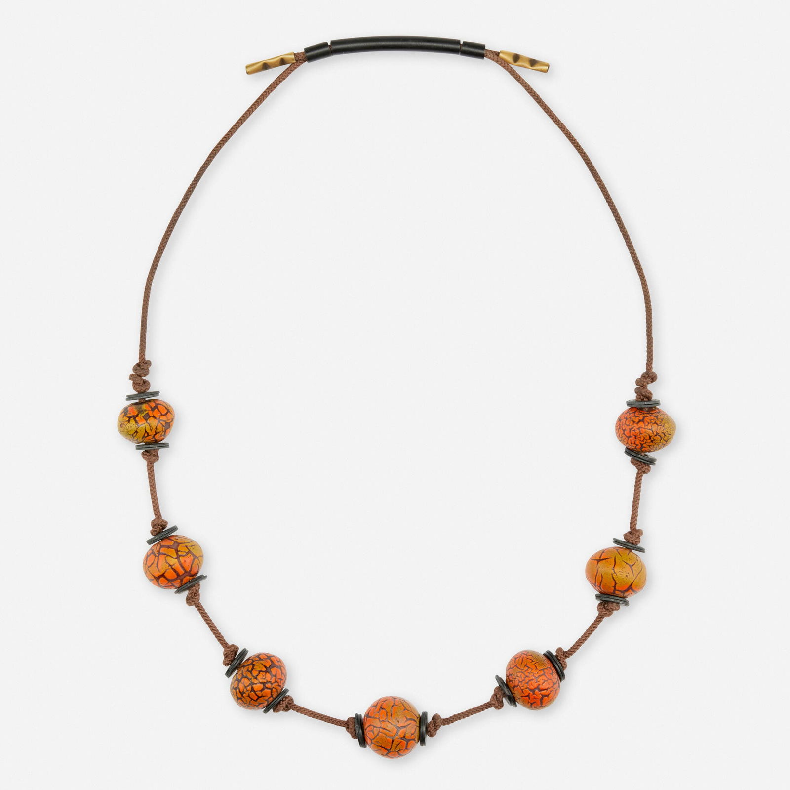 Doyle Lane, Necklace: Doyle Lane Necklace c. 1965glazed earthenware, cotton cord 14.25 h in (36 cm) Provenance: Reform Gallery, Los Angeles | Collection of Pamela Weir-Quiton Literat