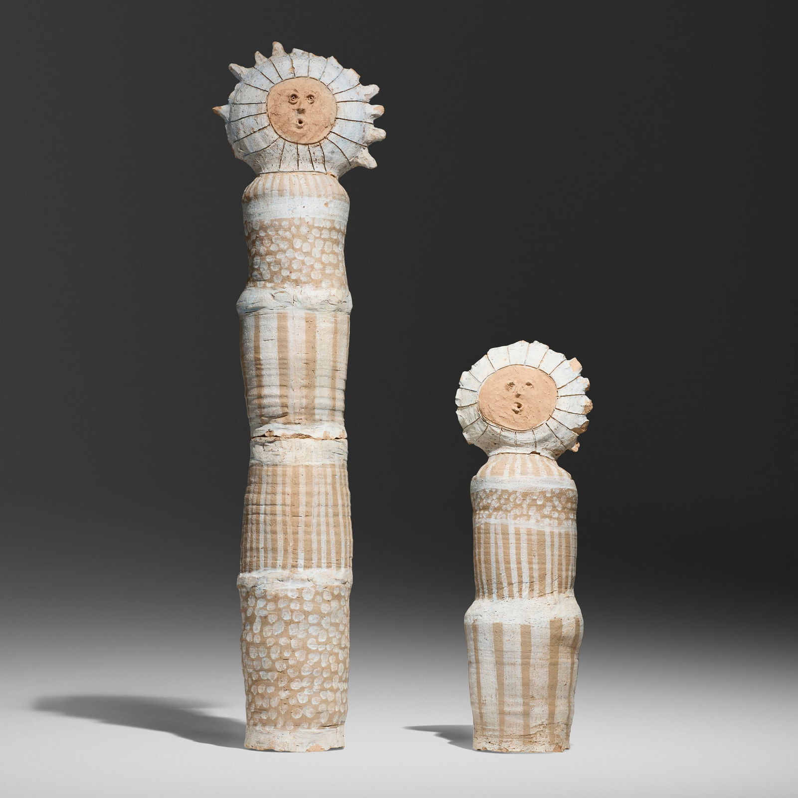 Stan Bitters, Sunflower People, set of two: Stan Bitters Sunflower People, set of two USA, c. 1961partially-glazed earthenware 53.5 h x 14 w x 9 d in (136 x 36 x 23 cm) 31 h x 11 w x 8 d in (79 x 28 x 20 cm) Provenance: