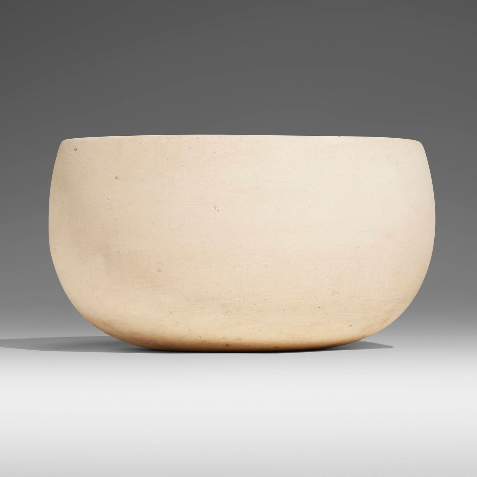 John Follis, Early planter: John Follis Early planter Architectural PotteryUSA, c. 1955bisque ceramic 6.625 h x 12 dia in (17 x 30 cm) Impressed manufacturer's mark to interior 'Architectural Made in U.S.'.