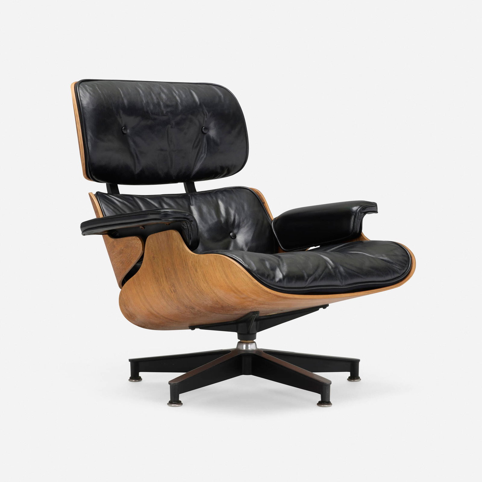Charles and Ray Eames, 670 lounge chair: Charles and Ray Eames 670 lounge chair Herman Miller USA, 1956 rosewood plywood, leather, brushed and enameled aluminum, rubber 33.25 h x 33 w x 32 d in (84 x 84 x 81 cm) Metal manufacture