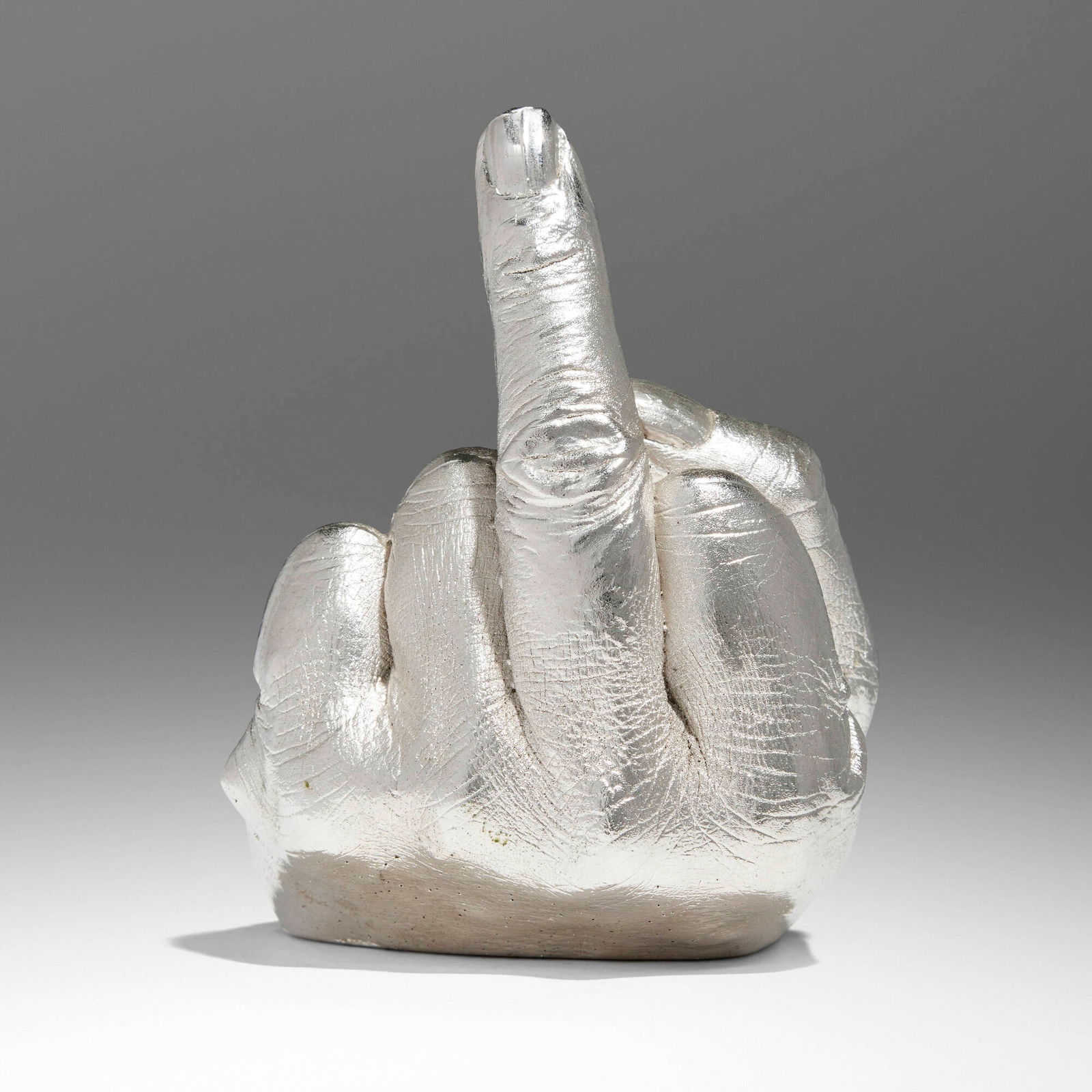 Ai Weiwei, The Artist's Hand: Ai Weiwei The Artist's Hand 2017electroplated rhodium on cast urethane resin 5 h x 4 w x 4.5 d in (13 x 10 x 11 cm) Incised signature to underside 'Wei Ai'. This work is from the edition of 10