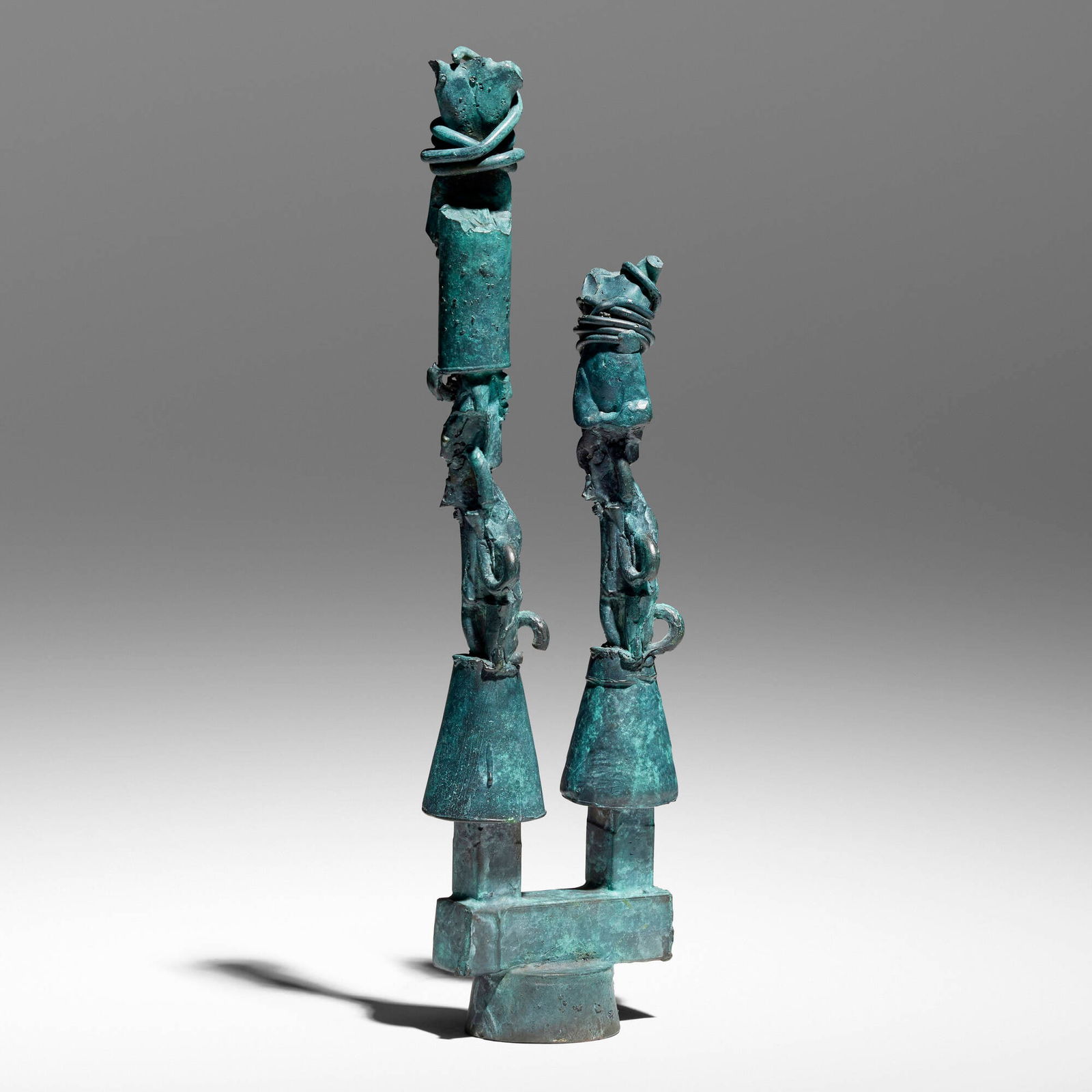 Robert Graham, Totems: Robert Graham Totems 1987patinated bronze 14.250 h x 3.500 w x 2.250 d in (36 x 9 x 6 cm) Incised signature, date and inscription to verso '11.25.87 For Roy RG'. This work is unique.
