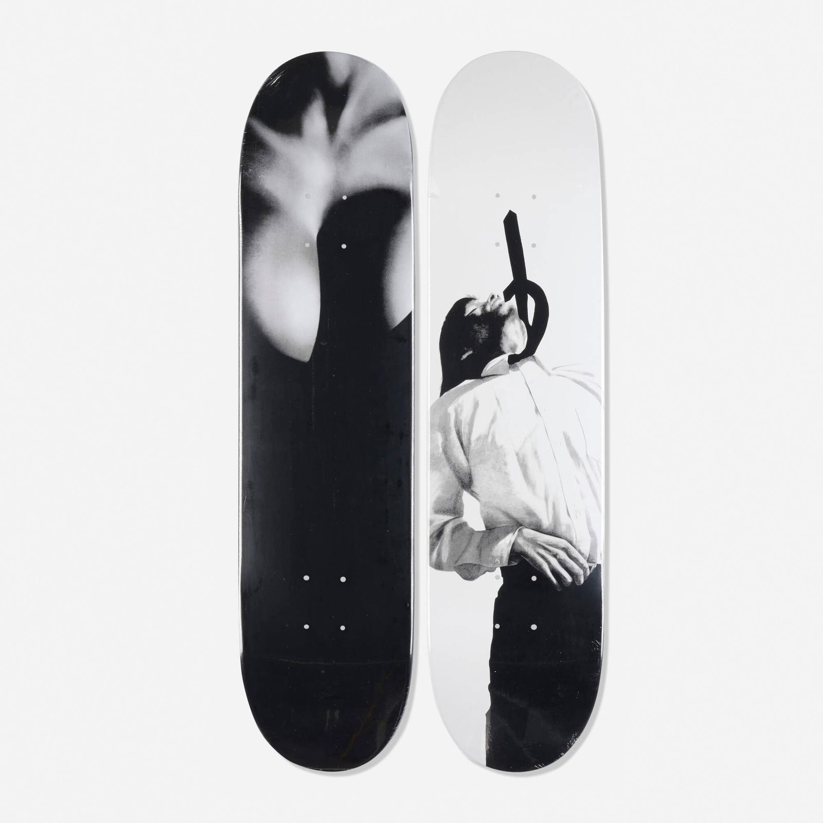 Robert Longo, Skateboard decks (set of two): Robert Longo Skateboard decks (set of two) 2011inkjet on skateboard deck each: 31.5 h x 8 w x 1.75 d in (80 x 20 x 4 cm) Artist's stamp to verso of each example. These examples are from the ed