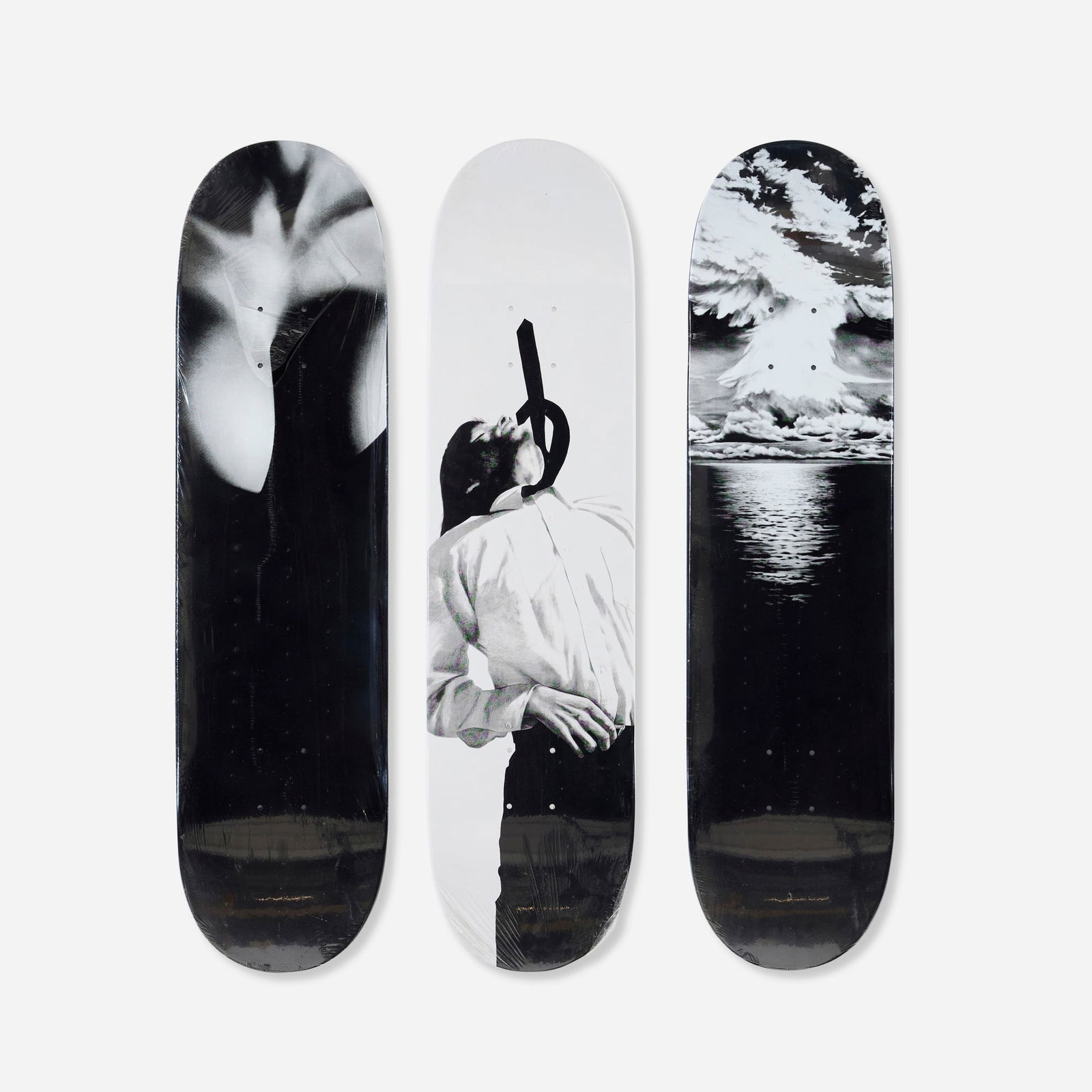Robert Longo X Supreme, Set of three skate decks: Robert Longo X Supreme Set of three skate decks transfer-printed plywood each: 31.625 h x 8 w x 0.375 d in (80 x 20 x 1 cm) overall: 31.626 h x 8 w x 0.375 d in (80 x 20 x 1 cm) Printed signature