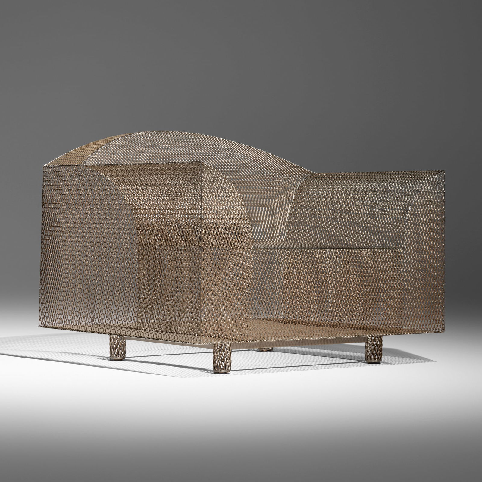 Shiro Kuramata, How High the Moon armchair: Shiro Kuramata How High the Moon armchair VitraJapan / Switzerland, 1986nickel-plated steel mesh 28.5 h x 37 w x 32.125 d in (72 x 94 x 82 cm) Decal manufacturer's label to base 'Vitra'.